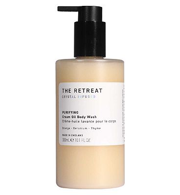 Click to view product details and reviews for The Retreat Purifying Cream Oil Body Wash 300ml.