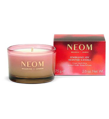 Click to view product details and reviews for Neom Wellbeing Sparkling Joy Travel Candle 75g.