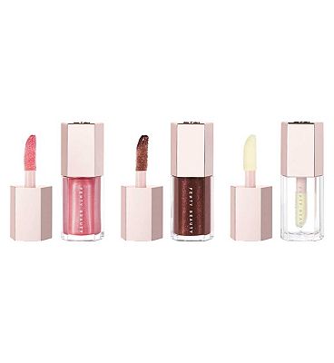 Click to view product details and reviews for Fenty Beauty Lil Gloss Bomb Trio Mini Lip Gloss Set.